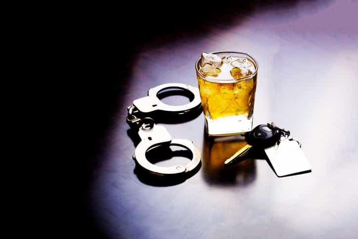 Car keys, alcohol and handcuffs