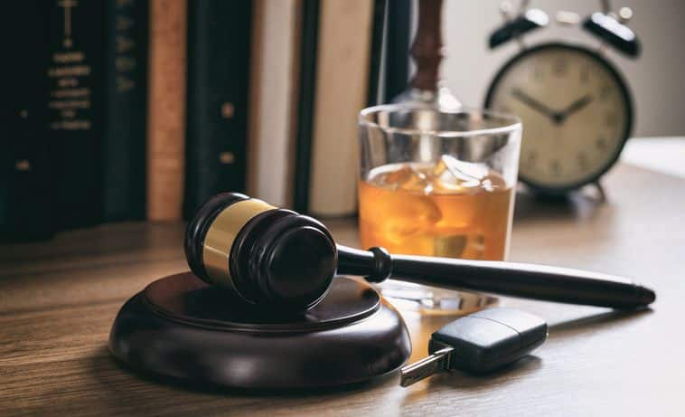 Law gavel, alcohol and car keys